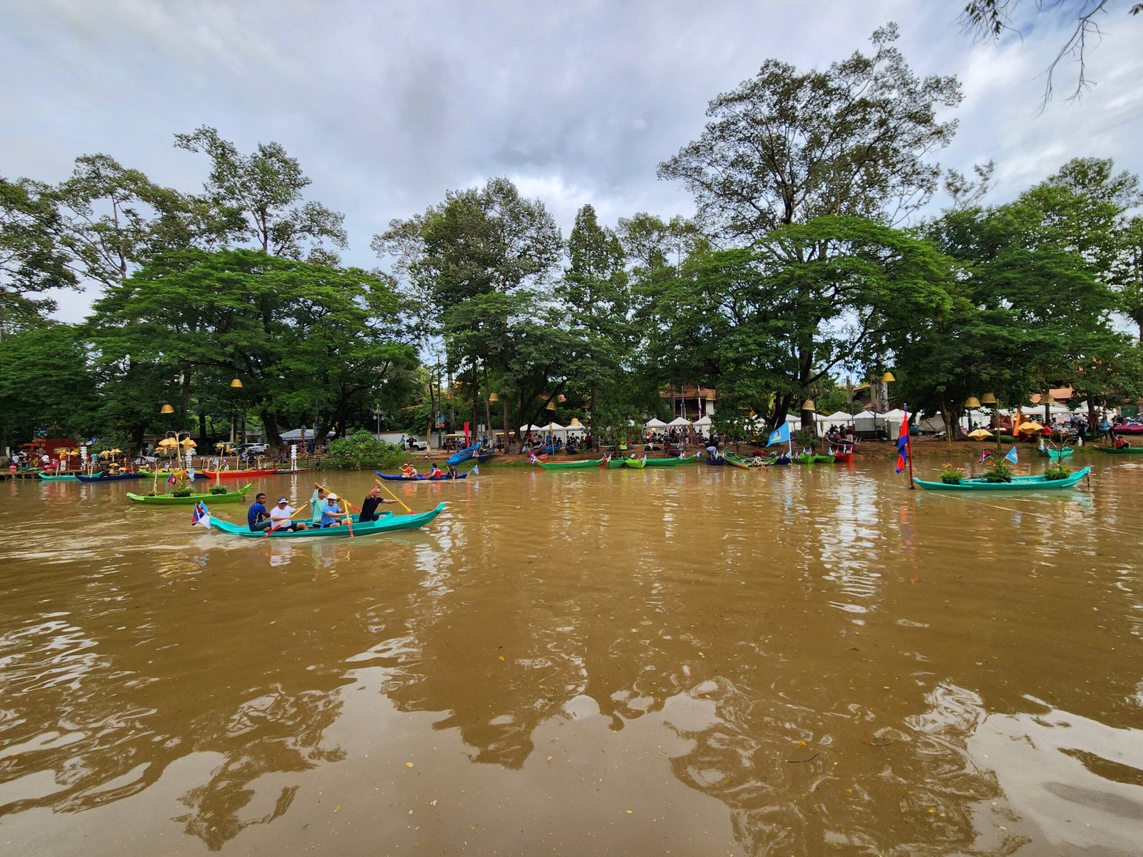 Canoe teams paddling on the Siem Reap River