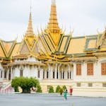 Stunning view of the Royal Palace in Phnom Penh, Cambodia with intricate golden spires.