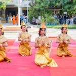 Five women in traditional Cambodian attire perform a cultural dance in Battambang Province.