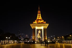 Stunning night view of Norodom Sihanouk Memorial in Phnom Penh, Cambodia, beautifully illuminated.