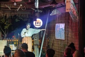 Stand-up comedian on stage at an Angkor Comedy Club night in Siem Reap