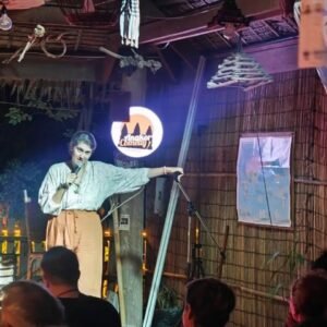 Stand-up comedian on stage at an Angkor Comedy Club night in Siem Reap