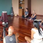 Yoga class in session at Aum Yoga Center studio, Siem Reap