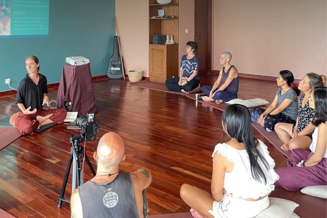 Yoga class in session at Aum Yoga Center studio, Siem Reap